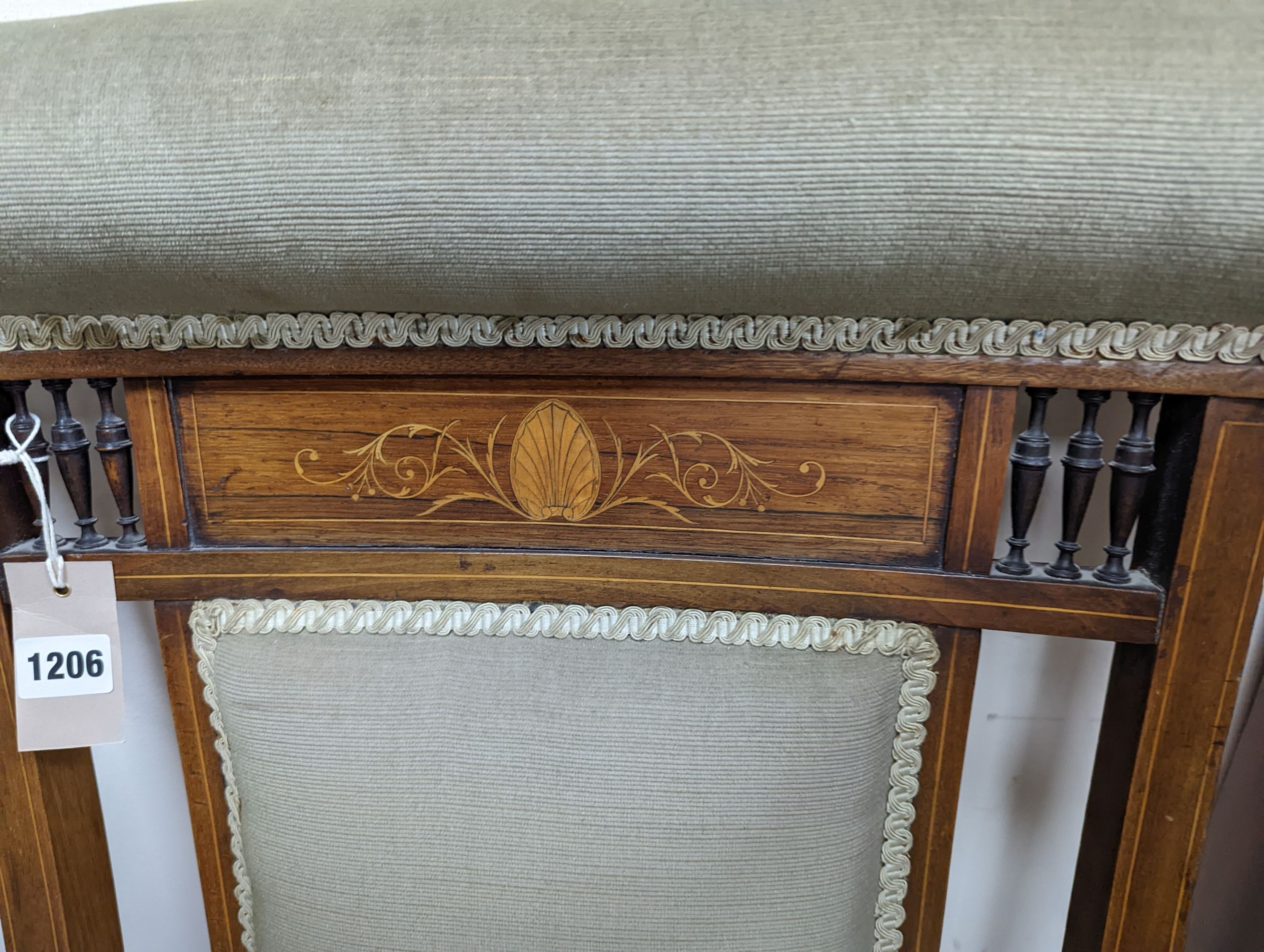 A late Victorian marquetry inlaid mahogany nursing chair